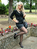 This outdoor shoot shows Kathryns gorgeous high heels and stockings off nicely